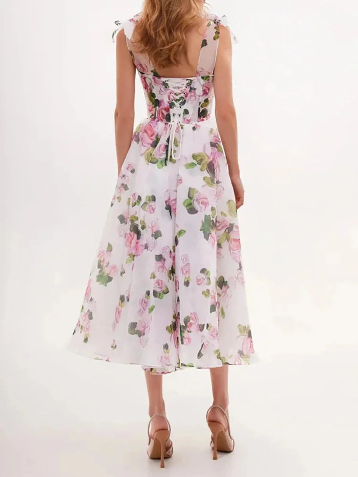 Elegant floral maxi dress featuring a flowy silhouette and stunning floral print, perfect for summer outings.