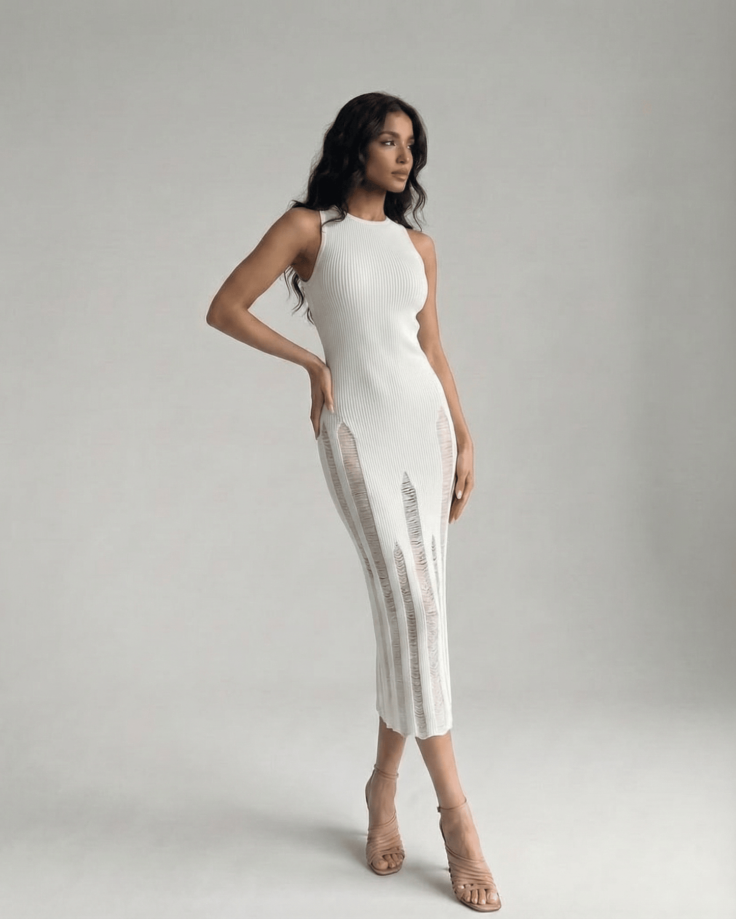 Alba Midi Dress by Lauven, featuring a sleek sleeveless design and refined white bodycon silhouette.