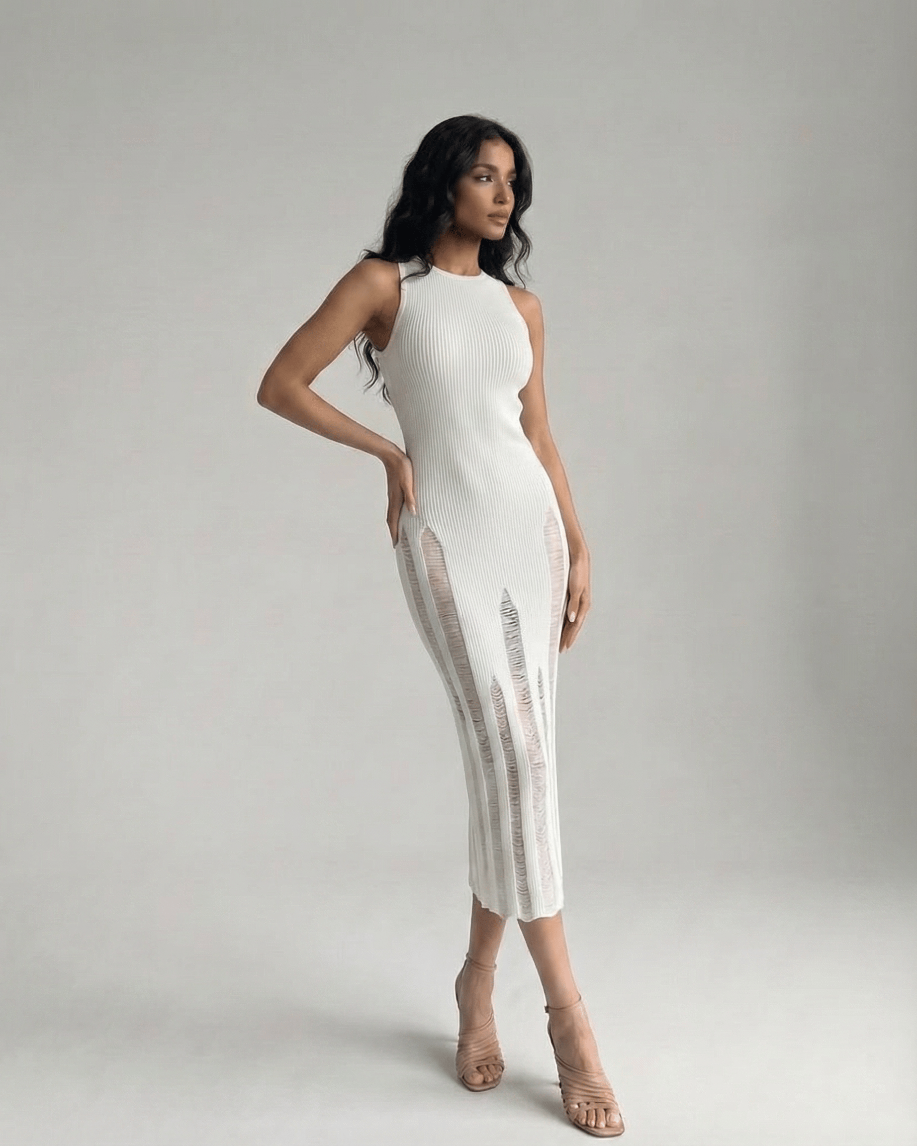 Alba Midi Dress by Lauven, featuring a sleek sleeveless design and refined white bodycon silhouette.