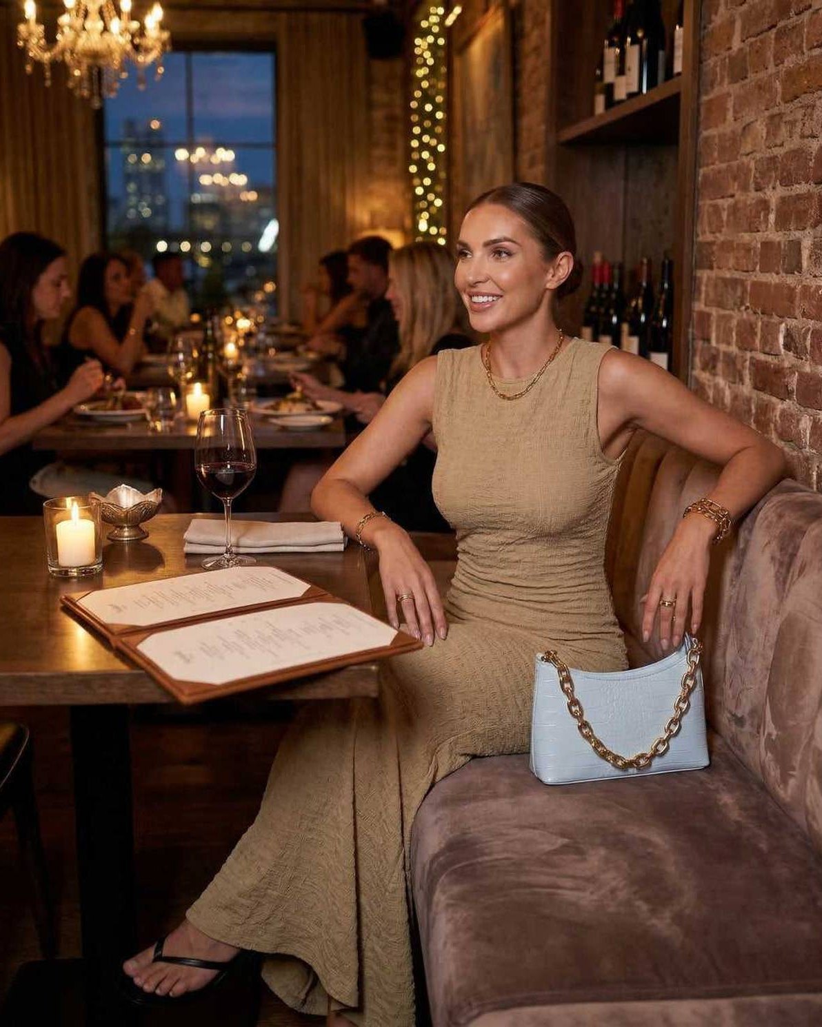 Alina Maxi Dress worn by a woman at a restaurant, showcasing the Lauven brand's stylish ankle-length design.