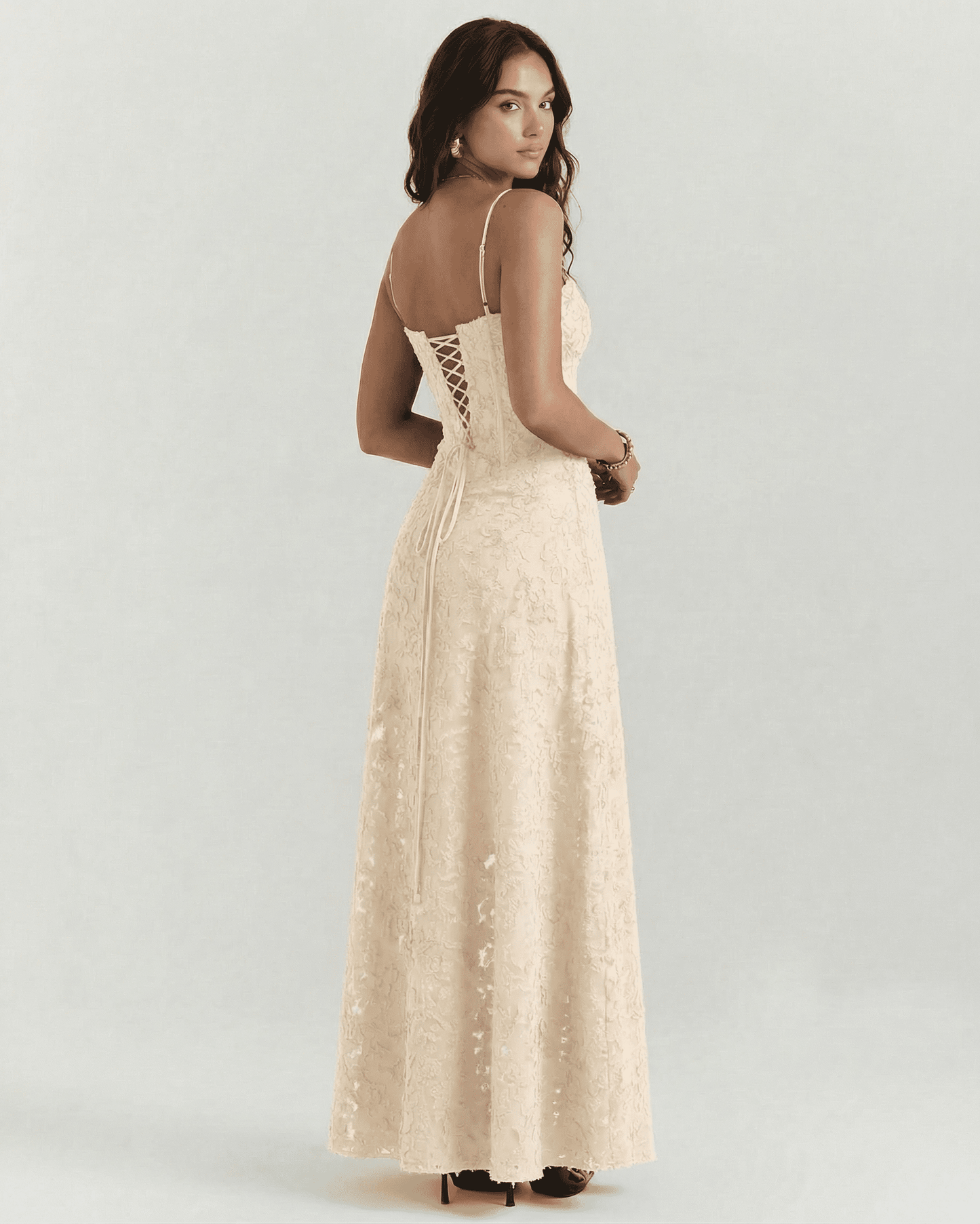Alina Maxi Dress by Lauven, showcasing nude floral lace and corset back detail from the rear view.