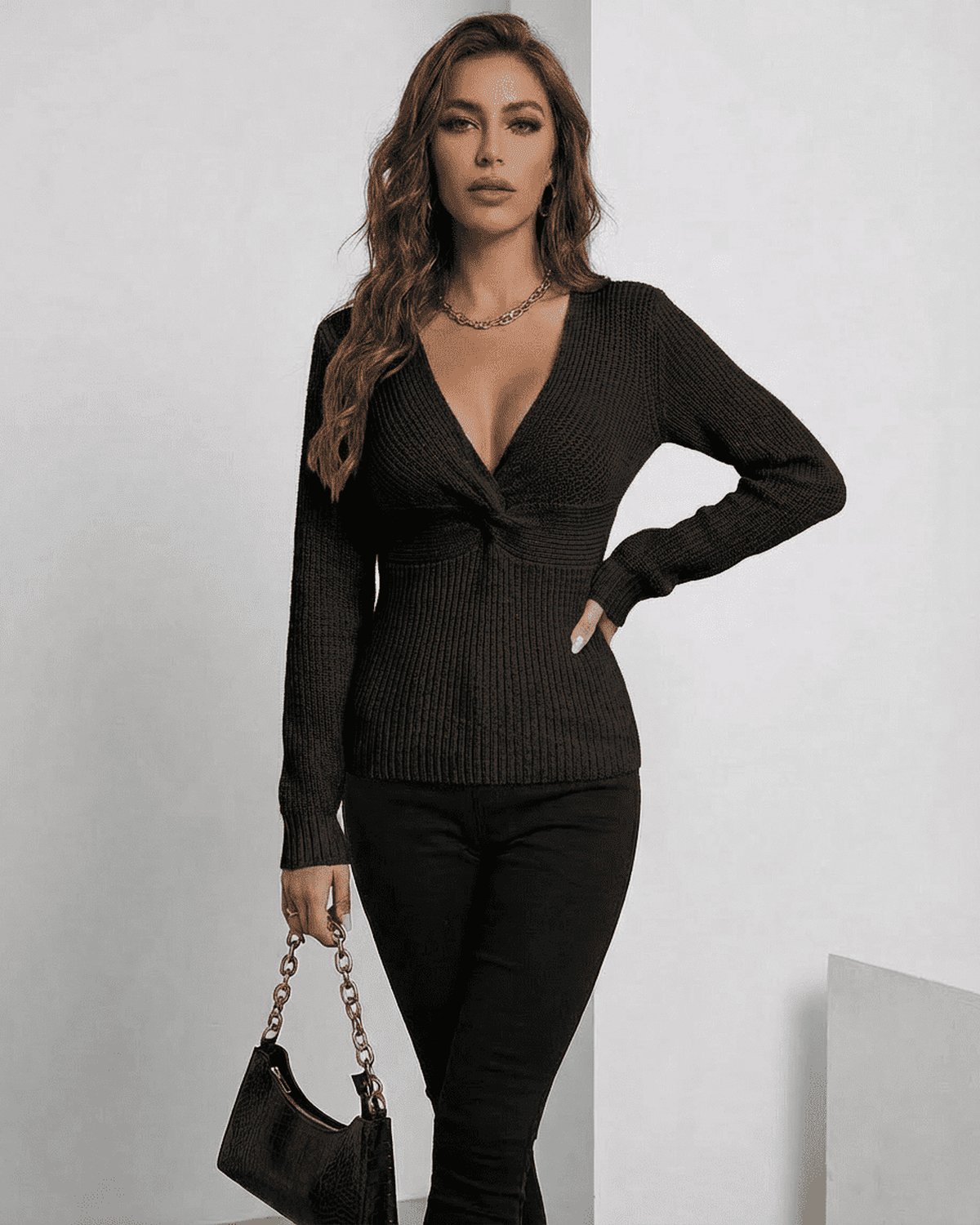 Alina Pullover by Lauven - Elegant black ribbed slim fit V-neck sweater captured on model.