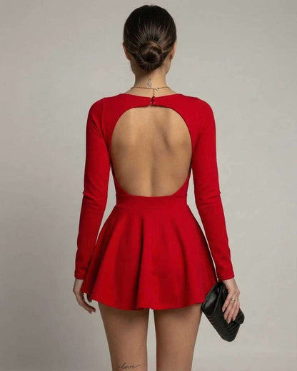 Back view of Allegra Mini Dress by Lauven in vibrant red with an open back and flared skirt.