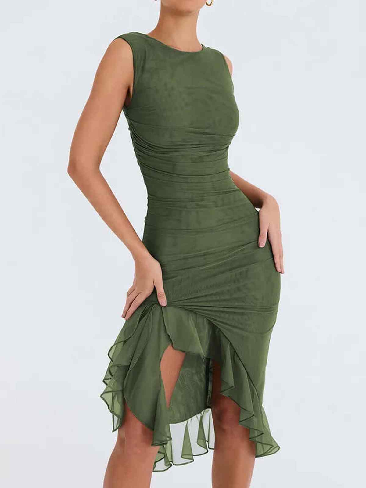 Elegant green mini dress with ruched detail and flared hem, perfect for weddings, parties, or summer events.