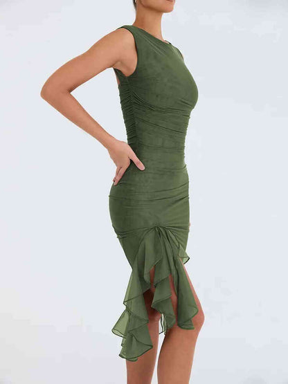 Elegant green bodycon midi dress with ruched hem, perfect for wedding guests and evening events.