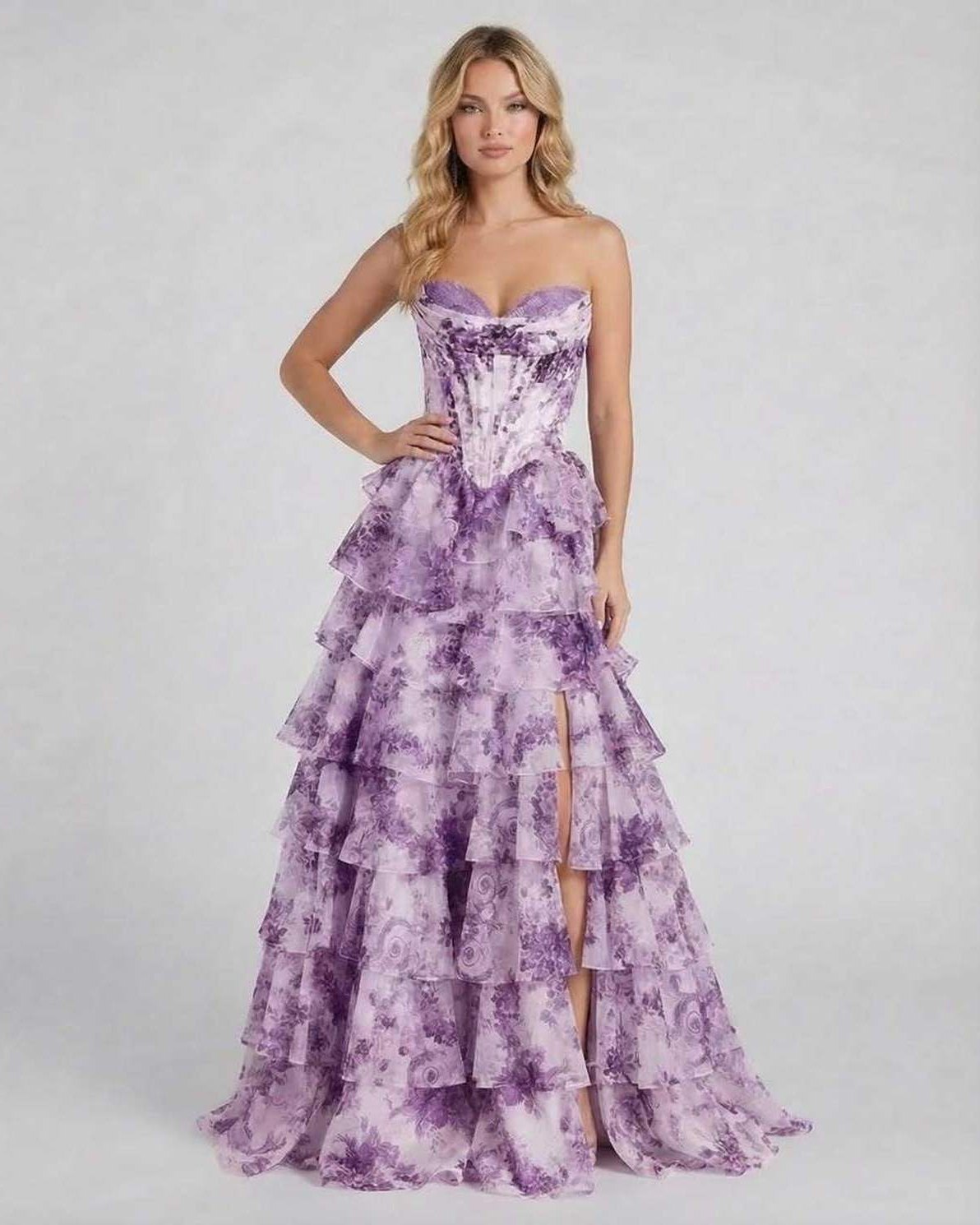 Amethyst Maxi Dress by Lauven in purple floral tiered chiffon, featuring a strapless corset bodice and dramatic skirt.