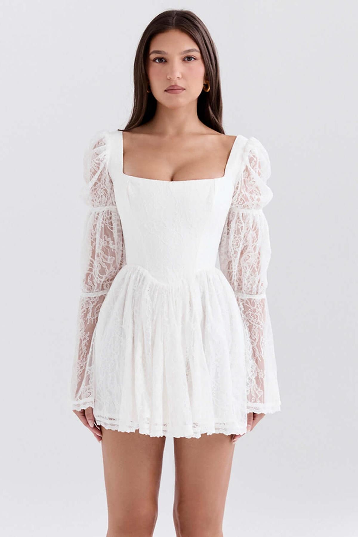 Elegant white mini dress with lace puff sleeves and square neckline, perfect for weddings and summer events.