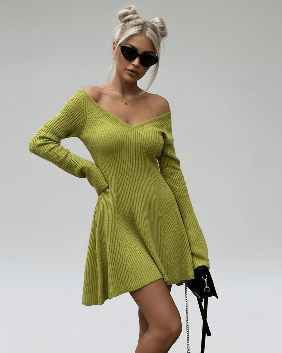 Aura Mini Dress by Lauven, slim fit green knit with V-neck and flared cuffs, perfect for stylish occasions.
