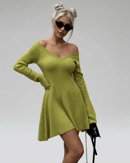 Aura Mini Dress by Lauven, slim fit green knit with V-neck and flared cuffs, perfect for stylish occasions.