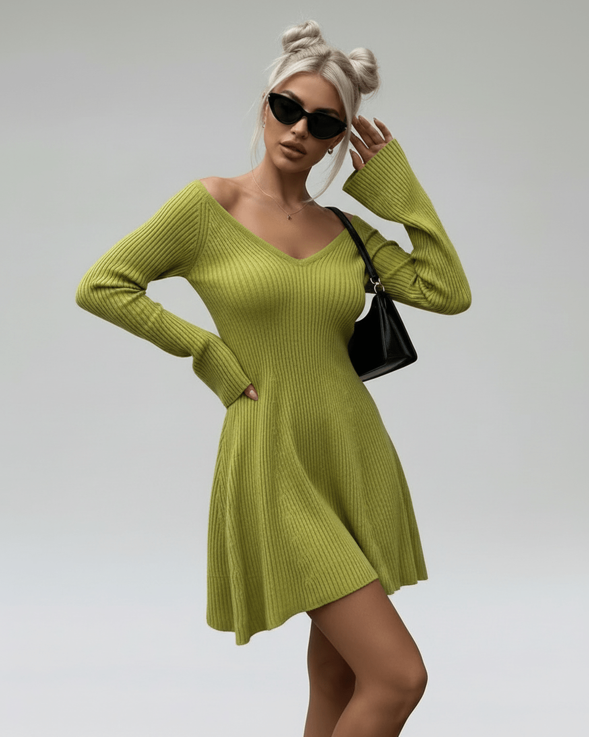 Aura Mini Dress by Lauven, slim fit green knit with V-neck, flared cuffs, and elegant A-line silhouette.