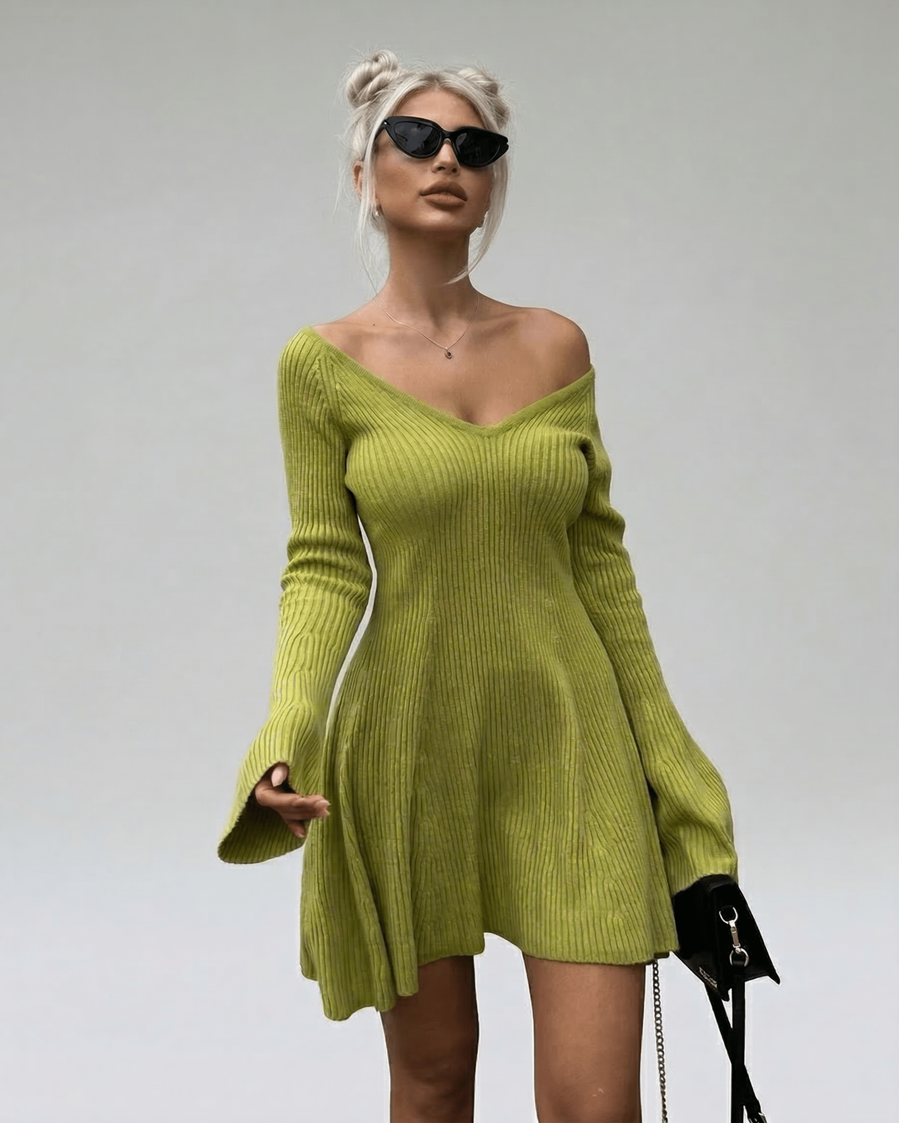 Aura Mini Dress by Lauven in green knit, featuring a V-neck and flared long sleeves for a stylish look.