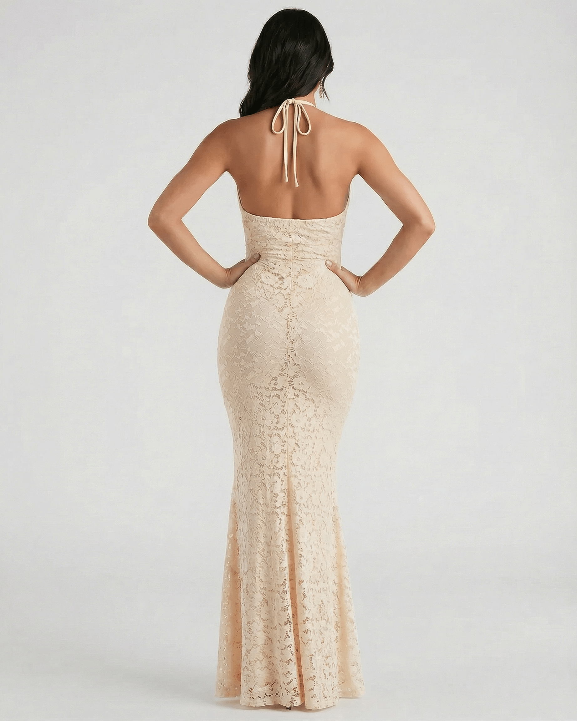 Aurelia Maxi Dress by Lauven featuring a lace V-neck trumpet silhouette, halter-style tie back, and ankle-length finish.