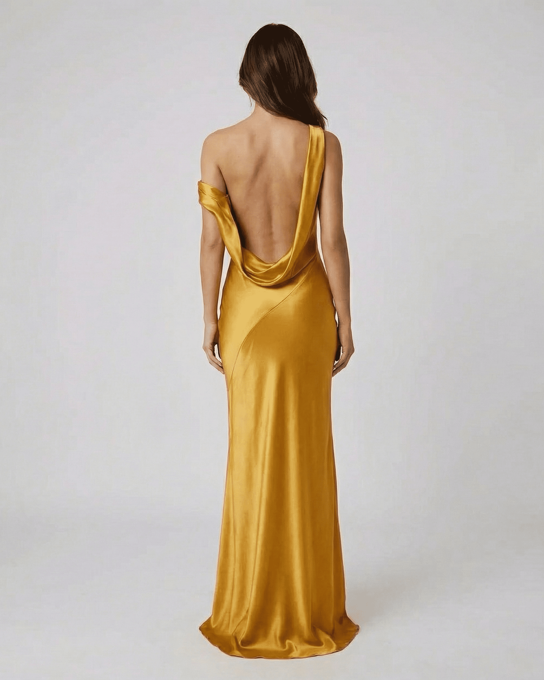 Aurelia Maxi Dress by Lauven - Stunning satin gold maxi dress with open back and high waist, showcasing a fluid silhouette.