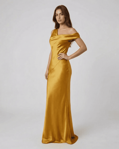 Aurelia Maxi Dress by Lauven, a stunning satin gold maxi dress featuring an elegant off-shoulder design.