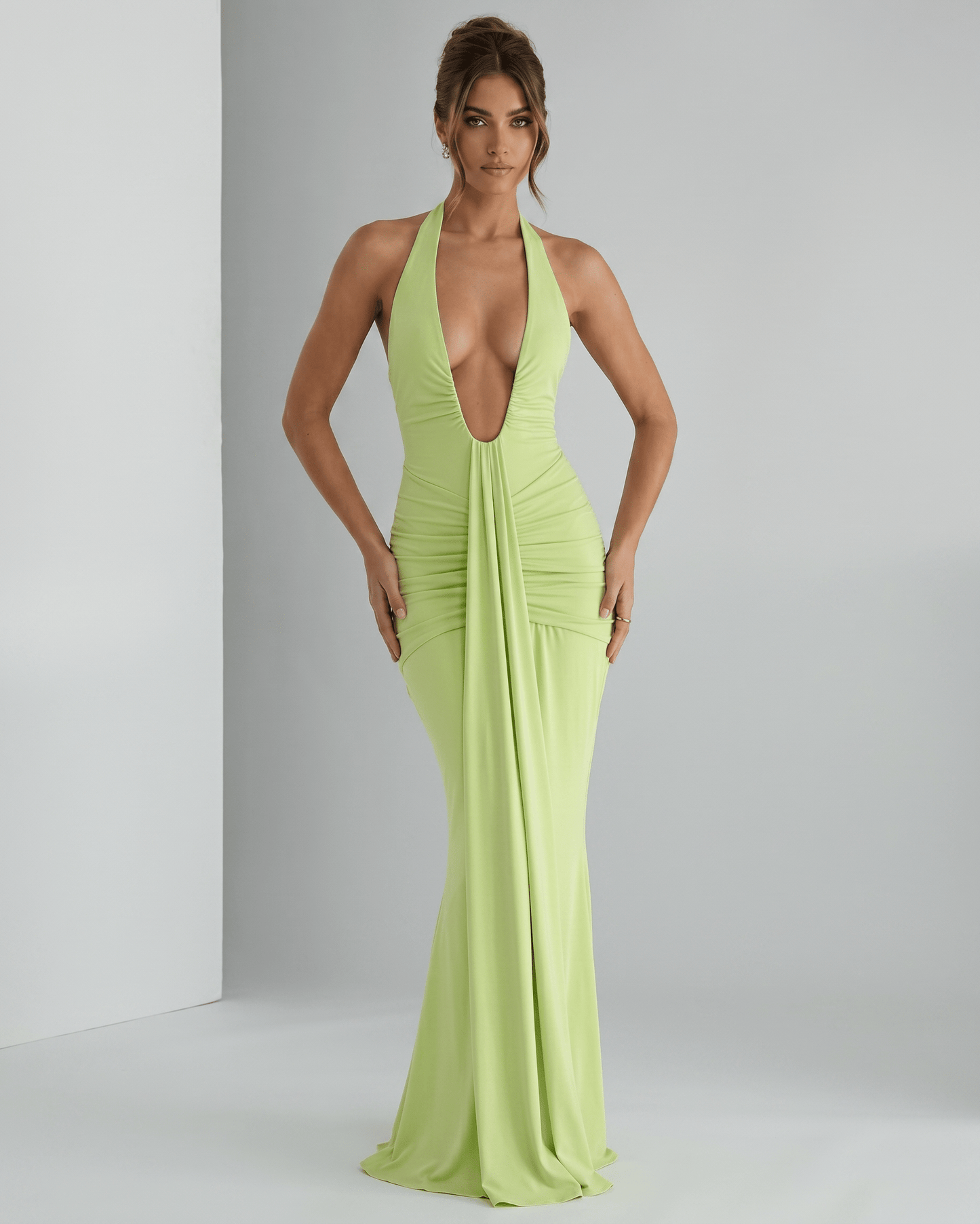 Aurelia Maxi Dress in vibrant lime green, featuring a halter neck and body-skimming ruched design by Lauven.