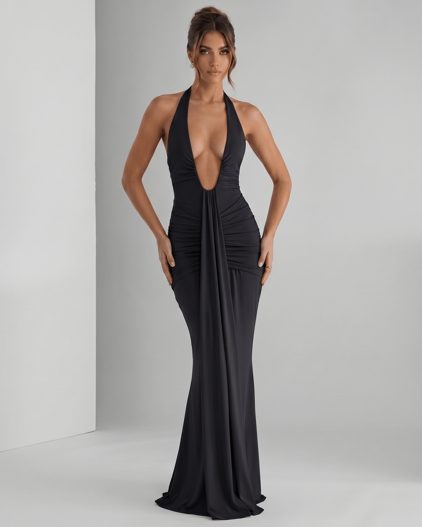 Aurelia Maxi Dress in black, featuring halter neck and stretch jersey fabric, designed for refined, modern occasions by Lauven.