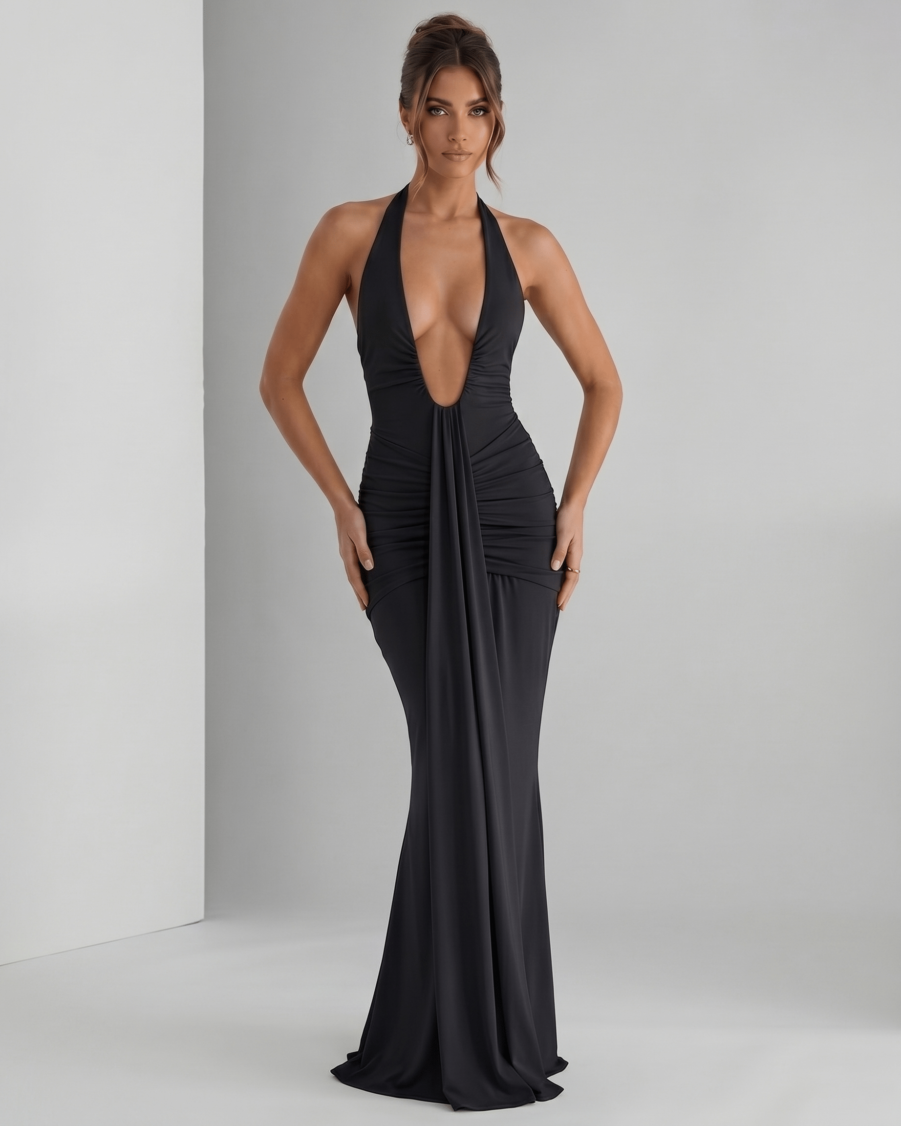 Aurelia Maxi Dress in black, featuring halter neck and stretch jersey fabric, designed for refined, modern occasions by Lauven.