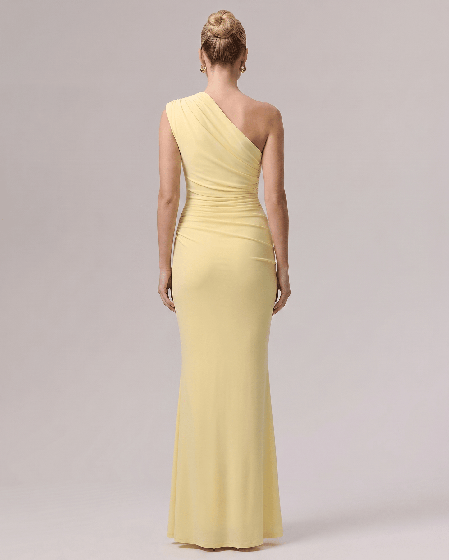 Aurelia Maxi Dress in smooth yellow stretch jersey, one-shoulder design with soft gathering for a refined silhouette by Lauven.