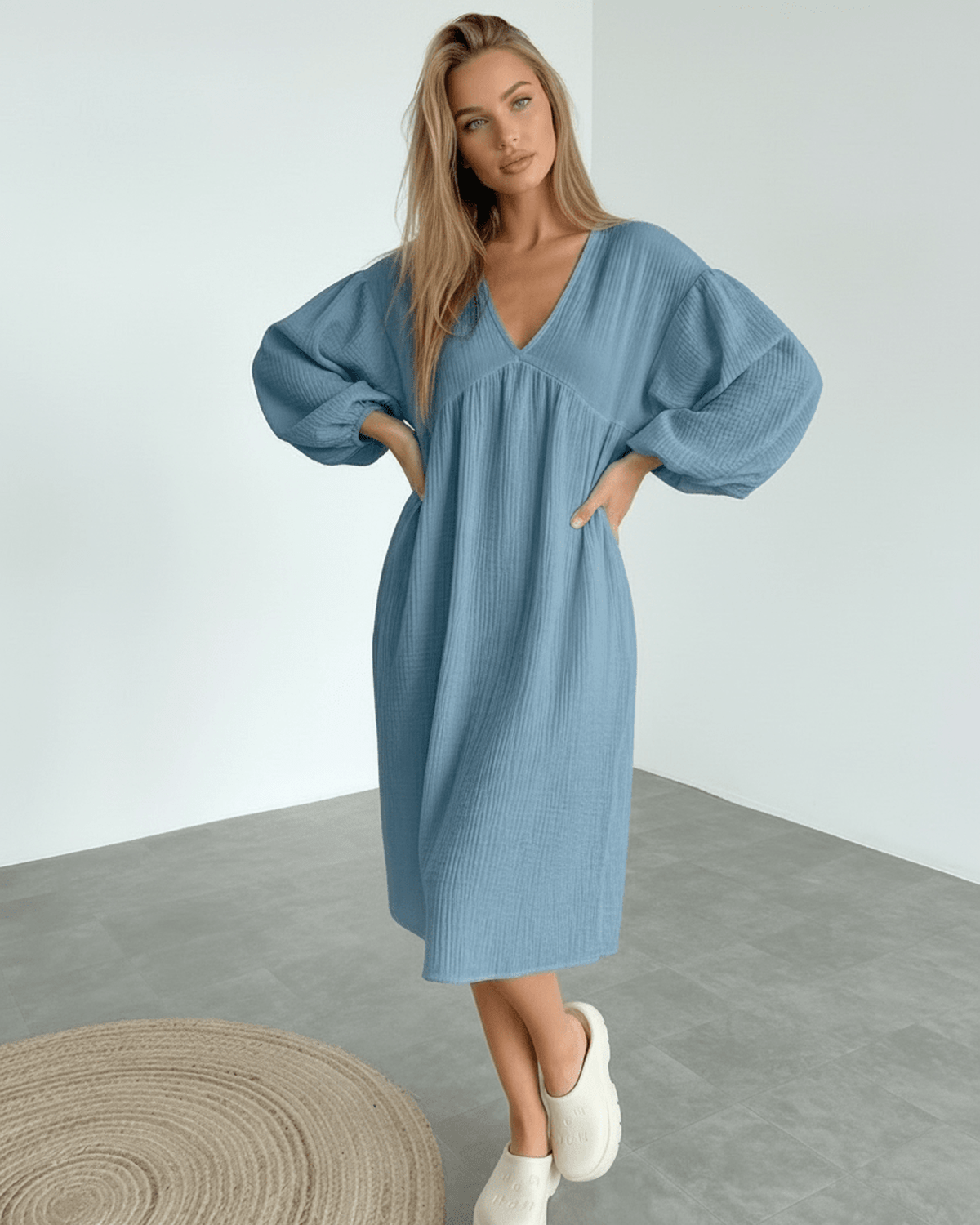 Aurelia Midi Dress in blue, featuring puff sleeves, crafted in breathable cotton for elegant comfort by Lauven.