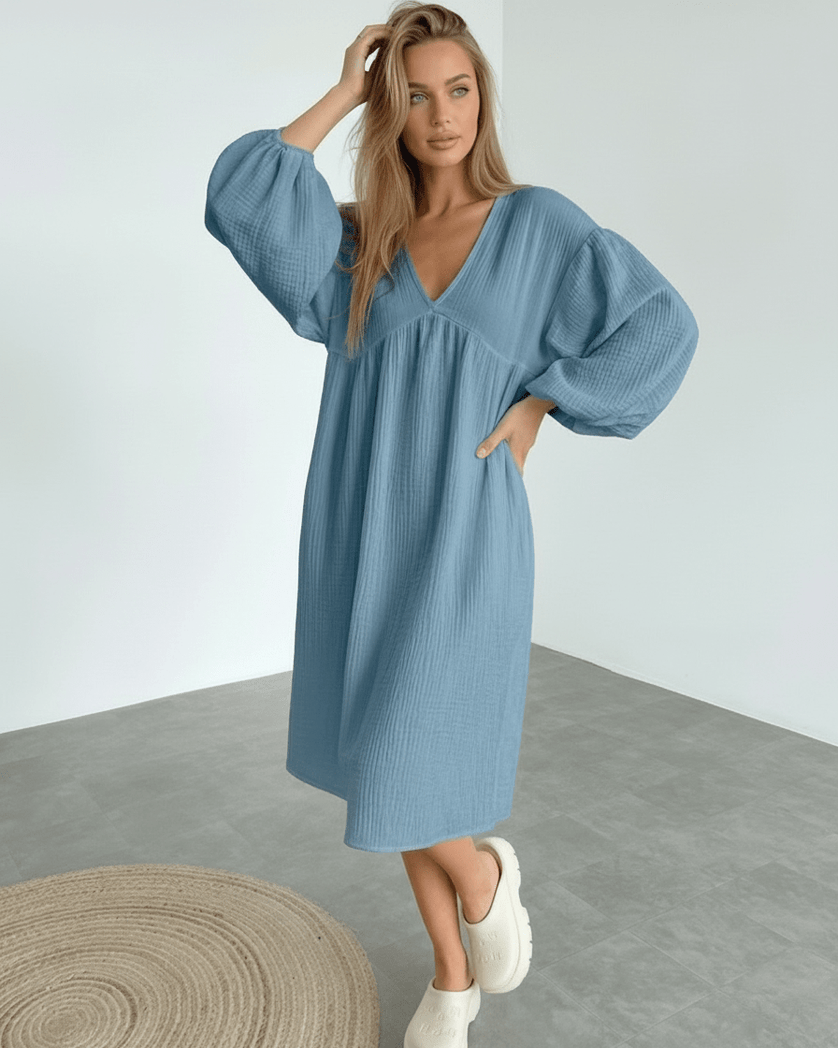 Aurelia Midi Dress in blue cotton, featuring puff sleeves and a flattering v neck, by Lauven for effortless sophistication.