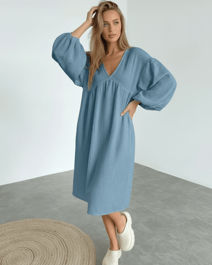 Aurelia Midi Dress in blue cotton, featuring puff sleeves and a flattering v neck, by Lauven for effortless sophistication.