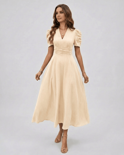 Aurelia Midi Dress cream midi dress with sleeves from Lauven, featuring V-neckline and puff sleeves for elegant occasions.