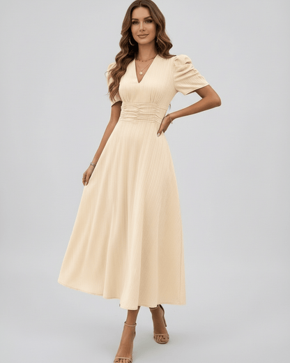 Aurelia Midi Dress features a cream hue, puff sleeves, ruched waist, elegant design perfect for weddings by Lauven.