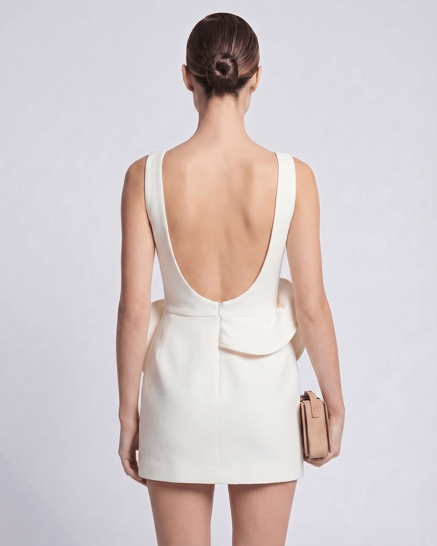 Aurelle Mini Dress featuring a boat neck, structured white design, and architectural sculptural waist detail by Lauven.