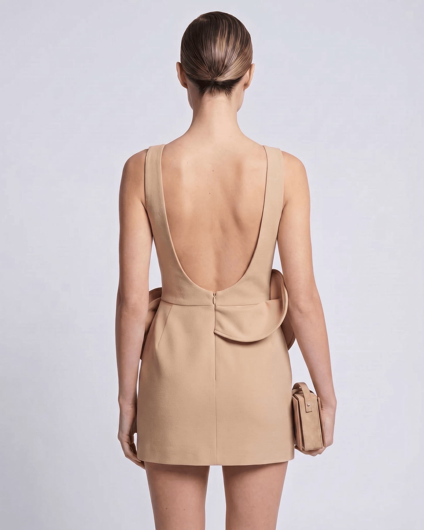 Aurelle Mini Dress features a deep back, structured silhouette, and elegant design from Lauven, perfect for modern style.