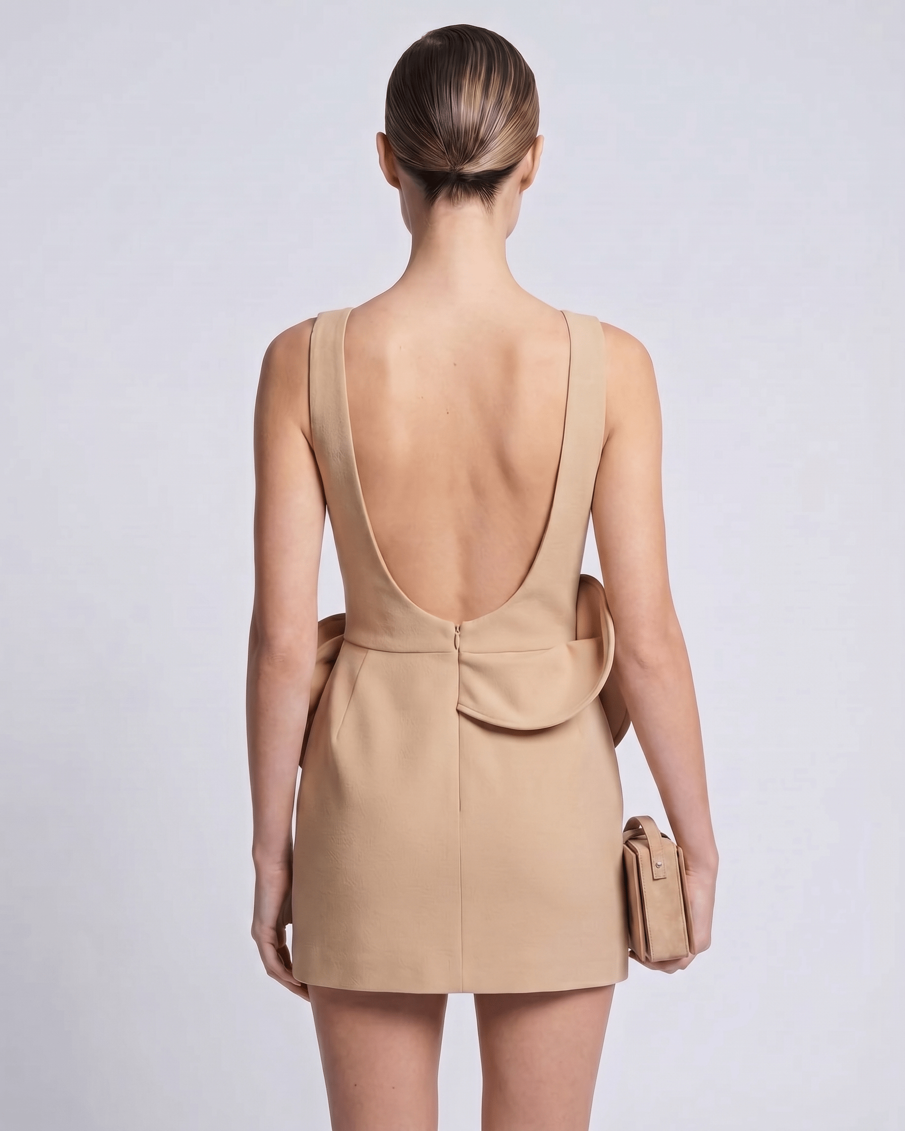 Aurelle Mini Dress features a deep back, structured silhouette, and elegant design from Lauven, perfect for modern style.