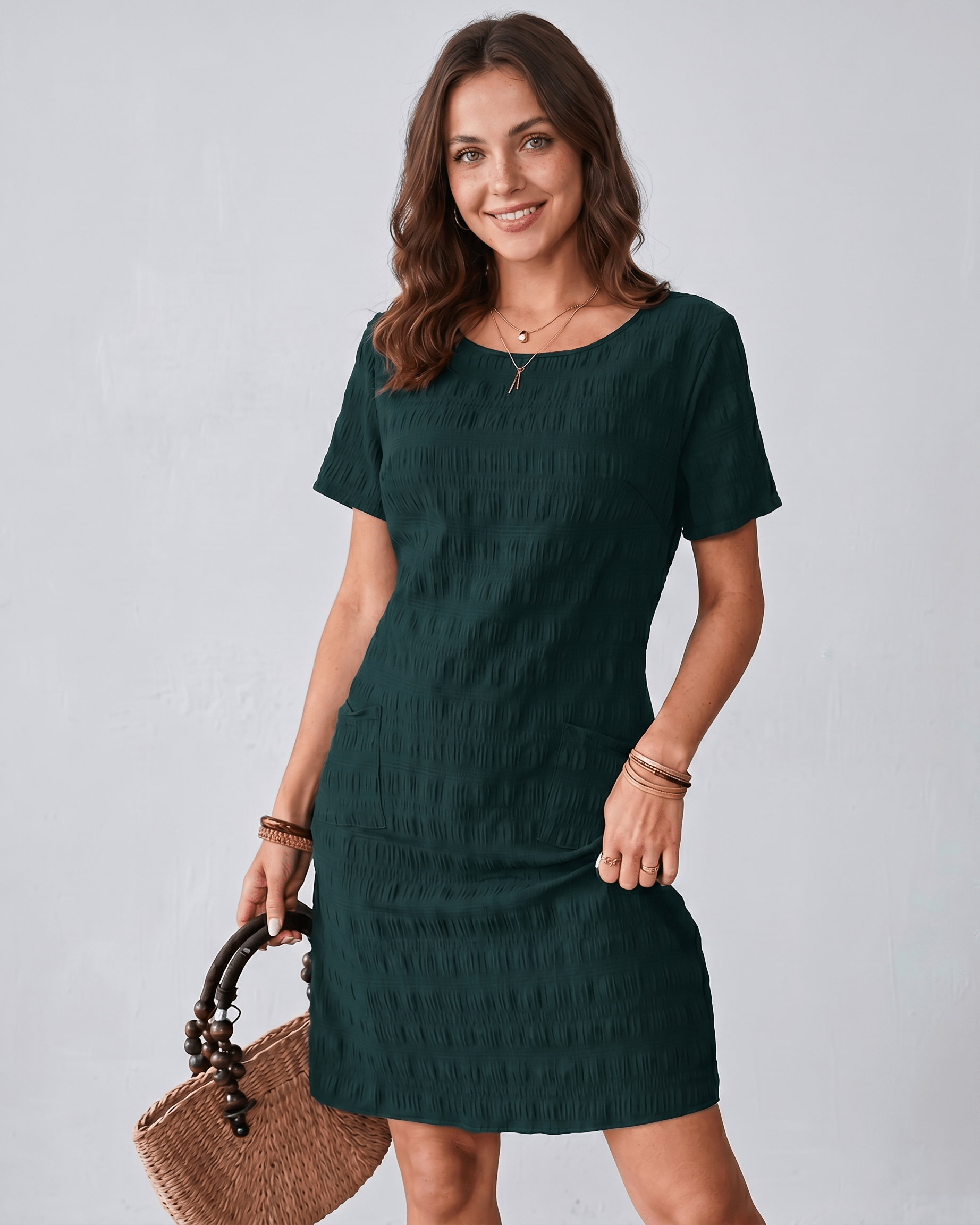 Avelin Mini Dress in textured fabric with round neckline, featuring short sleeves and a modern silhouette by Lauven.