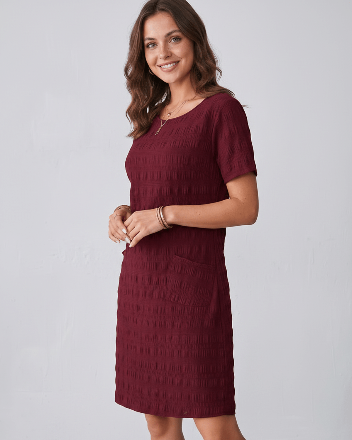 Avelin Mini Dress in burgundy, textured fabric, round neckline, short sleeves, modern style by Lauven.