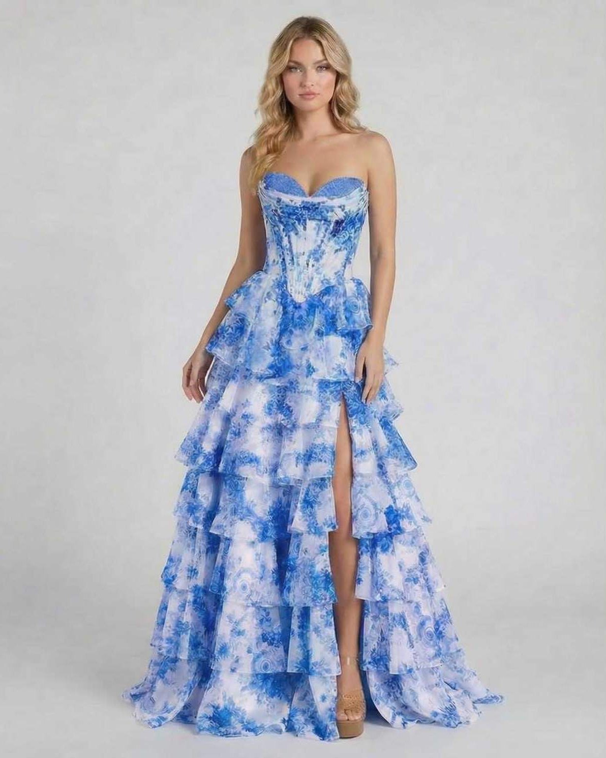 Azura Maxi Dress by Lauven - Stunning blue floral tiered chiffon gown with a high slit and structured corset bodice.