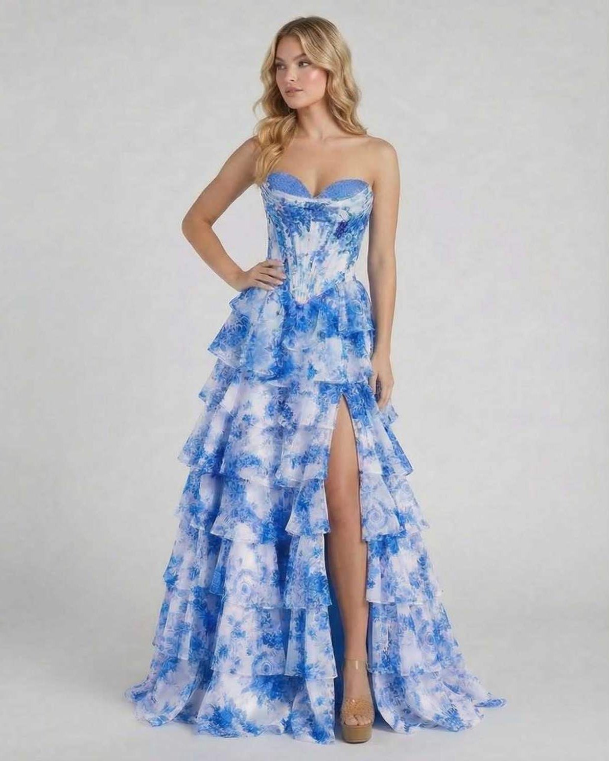 Azura Maxi Dress by Lauven in blue floral tiered chiffon with high slit and structured corset bodice.