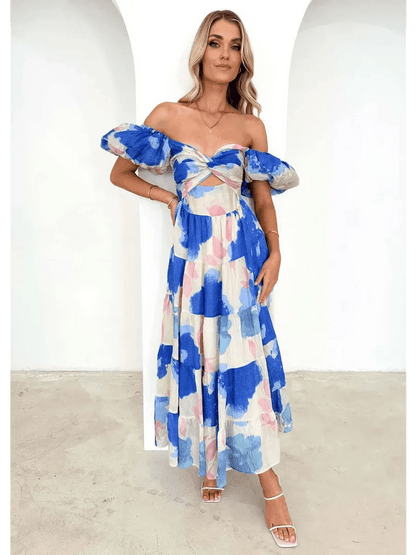 Azure Bloom Maxi Dress featuring off-shoulder design and watercolor floral prints in blue and pink.