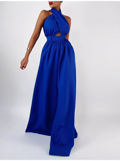 Azure halter jumpsuit featuring a bold open back and wide-leg silhouette, perfect for summer events.