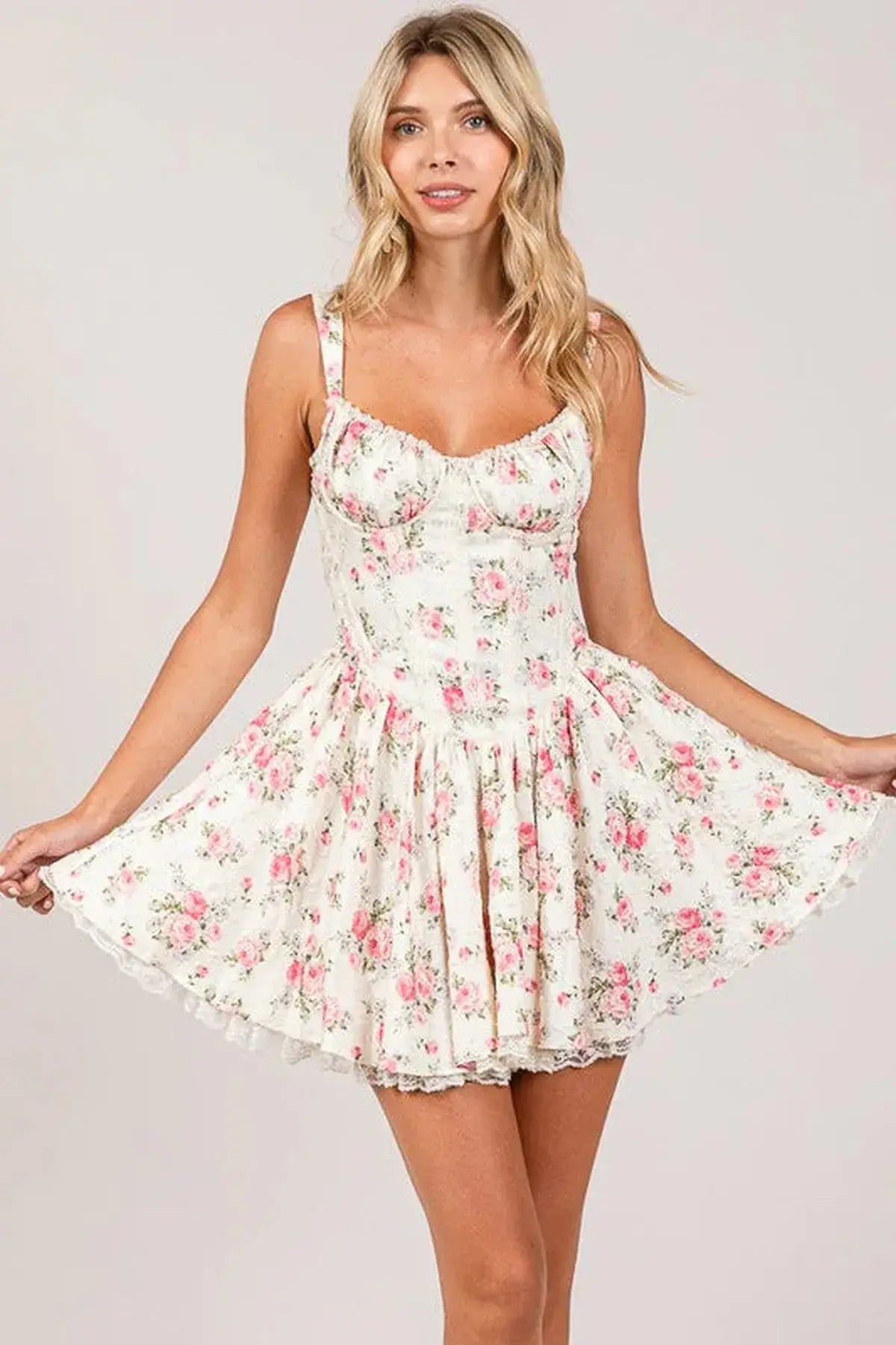 Barbie Mini Dress with floral pattern, corset bodice, and flared skirt, ideal for summer and party occasions.