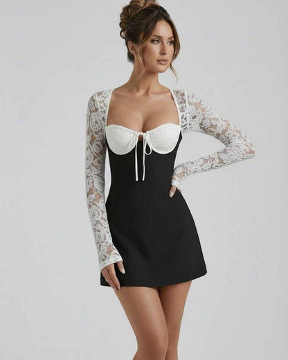 Bianca Lace Dress by Lauven - Black mini dress with white lace sleeves and structured bust, elegant and feminine.
