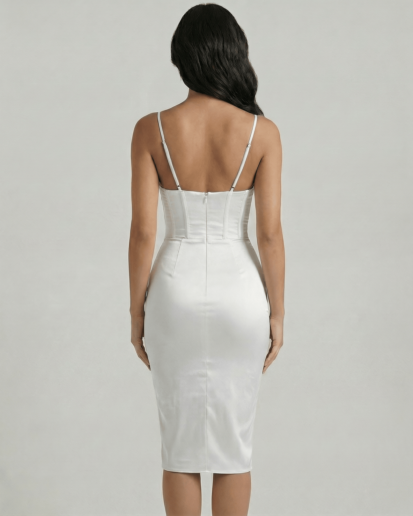 Back view of Bianca Midi Dress by Lauven, showcasing a fitted white satin corset design.
