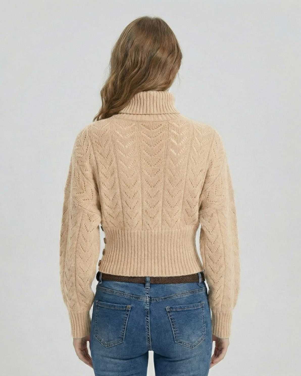 Back view of a woman wearing the Biscotti Sweater by Lauven showcasing a stylish turtleneck design and ribbed hem.