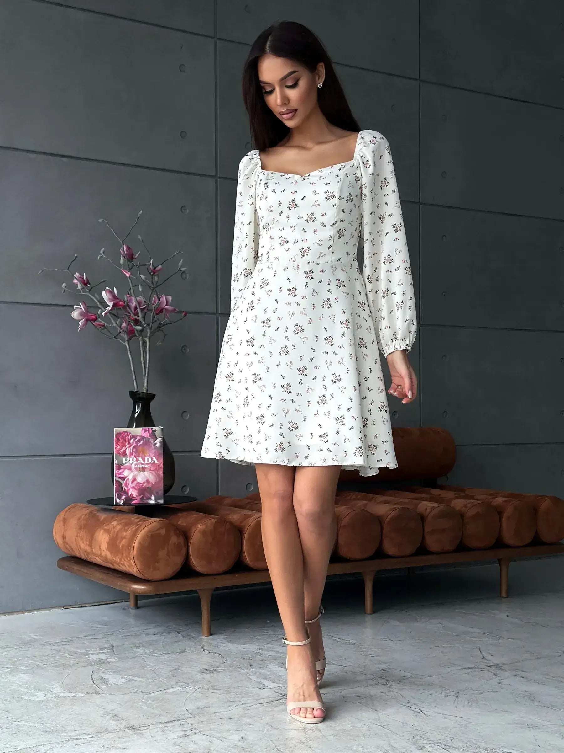 Elegant white summer dress with delicate floral print, perfect for weddings, parties, and casual outings.