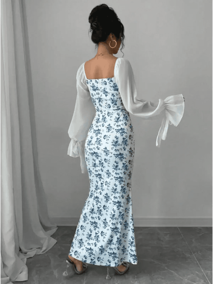 Back view of the Bluebelle Maxi Dress featuring vintage floral print and sheer bell sleeves, ideal for elegant occasions.
