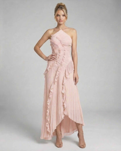 Blush Maxi Dress by Lauven featuring soft pink pleated chiffon with ruffle details and an adjustable halter neck.