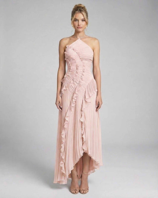 Blush Maxi Dress by Lauven - Soft pink pleated halter neck gown with ruffle details and flowing silhouette.