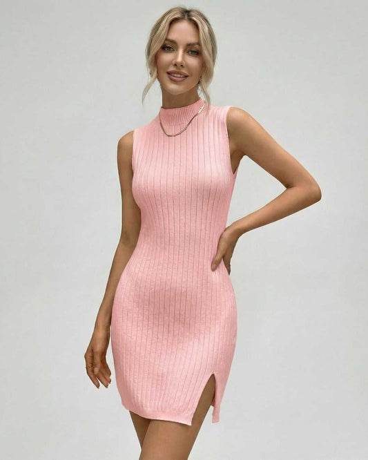 Blushia Mini Dress by Lauven - Ribbed sleeveless turtleneck mini dress in soft pink with elegant vertical ribbing and side slit.