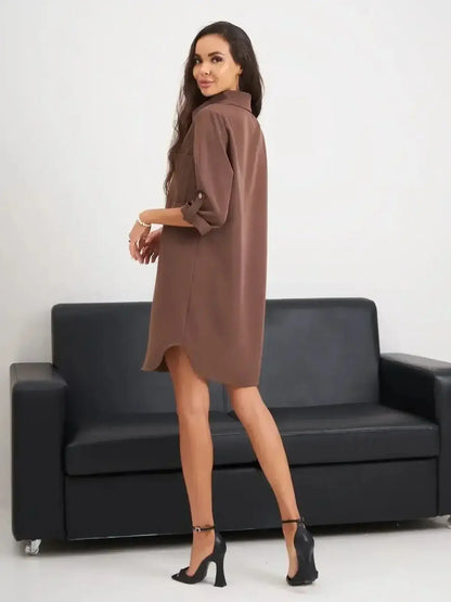 Back view of a woman in a chic brown mini dress, perfect for summer and casual outings.