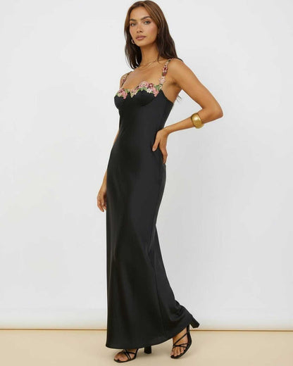 Elegant Calista Maxi Dress featuring floral embroidery, smooth satin fabric, and sleek silhouette by Lauven.