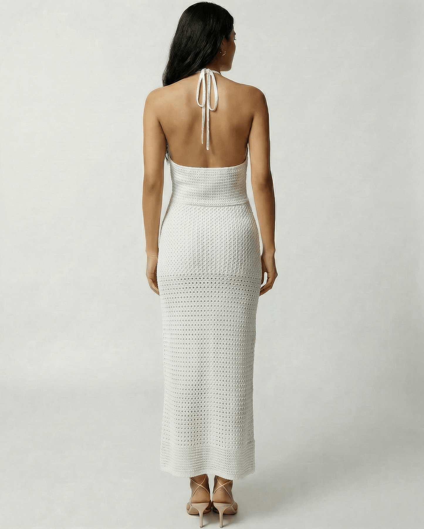 Calista Maxi Dress by Lauven, featuring a crochet halter design with an open back and elegant silhouette.