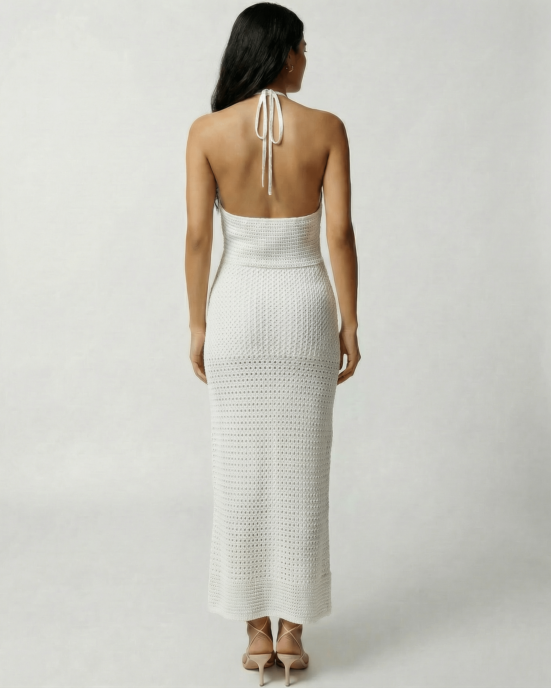 Calista Maxi Dress by Lauven, featuring a crochet halter design with an open back and elegant silhouette.