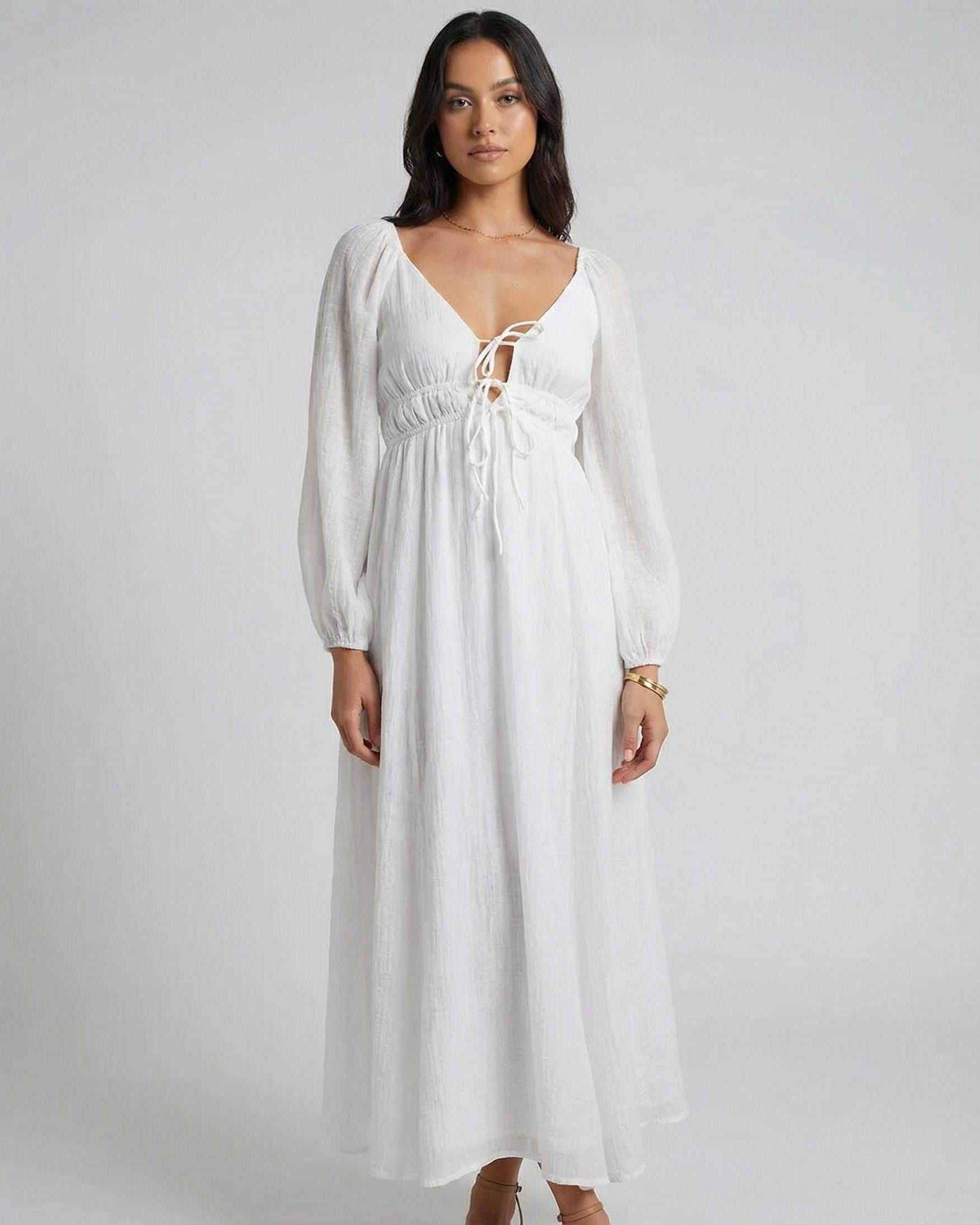 Calista Maxi Dress by Lauven featuring a deep V-neck, flowing silhouette and long sleeves, perfect for spring styling.